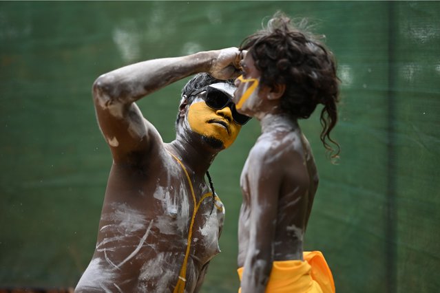 Members of the Gumatj clan of the Yolngu people from north-eastern Arnhem Land prepare for the Bunggul traditional dance during the 25th annual Garma Festival in Gulkula, Northern Territory, Australia, 01 August 2025. Garma Festival, Australia's most significant Indigenous cultural gathering, is held each year on Yolŋu Country in northeast Arnhem Land, uniting ceremony, community, and national dialogue as it celebrates a significant 25-year milestone in 2025. (Photo by James Ross/EPA)