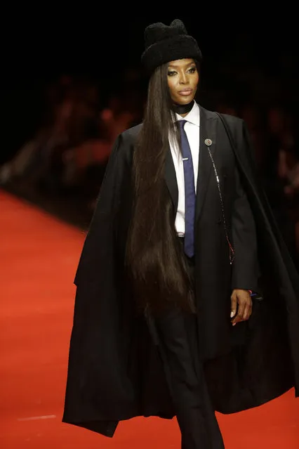 British model Naomi Campbell displays an outfit by designer Ozwald Boateng during the ARISE Fashion Week event in Lagos, Nigeria, Sunday, April 1, 2018. (Photo by Sunday Alamba/AP Photo)