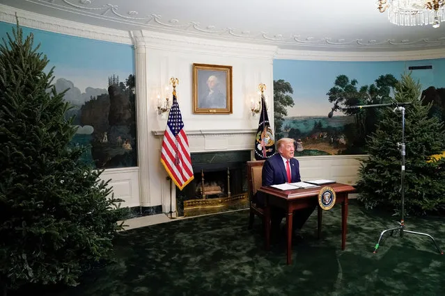 U.S. President Donald Trump participates in a Thanksgiving video teleconference with members of the military forces at the White House in Washington, U.S., November 26, 2020. (Photo by Erin Scott/Reuters)
