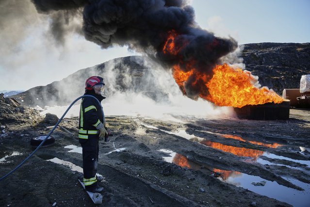 Greenlandic young firefighters participate in the Arctic basic training course supervised by Danish Army in Sisimiut, Greenland, Tuesday, September 16, 2025. (Photo by Ebrahim Noroozi/AP Photo)