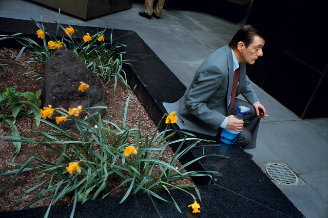 “Maybe everything will go down that sewer in the end” … Man with Windex, New York City, 1996, by Jeff Mermelstein. (Photo by Jeff Mermelstein/The Guardian)