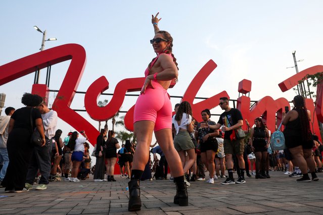 A woman poses for a picture during the Rock in Rio music festival in Rio de Janeiro, Brazil, on September 14, 2024. (Photo by Pilar Olivares/Reuters)