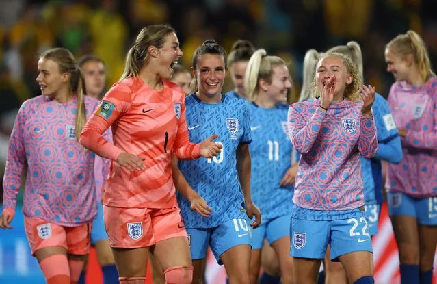England's Mary Earps, Ella Toone and Katie Robinson celebrates after the team's 3-1 victory and advance to the final following the FIFA Women's World Cup Australia – New Zealand 2023 match between Australia and England at Australia Stadium on August 16, 2023 in Sydney, Australia. (Photo by Hannah Mckay/Reuters)