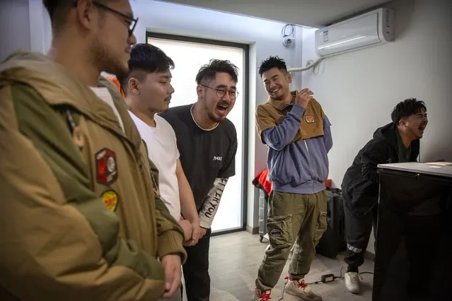 Members of the Chinese music group Produce Pandas, from left, Husky, Otter, DING, Mr. 17, and Cass, react while practicing their vocals during rehearsals in Beijing, Thursday, April 15, 2021. The Produce Pandas proudly call themselves “the first plus-sized boy band in China”. That's a radical departure from the industry standard set by Korean super groups such as BTS, whose lanky young members are sometimes referred to in China as “little fresh meat”. (Photo by Mark Schiefelbein/AP Photo)