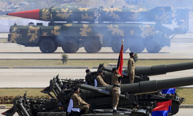 A Hatf-VI (Shaheen-II) missile (background) is displayed during the Pakistan Day parade in Islamabad March 23, 2015. (Photo by Faisal Mahmood/Reuters)