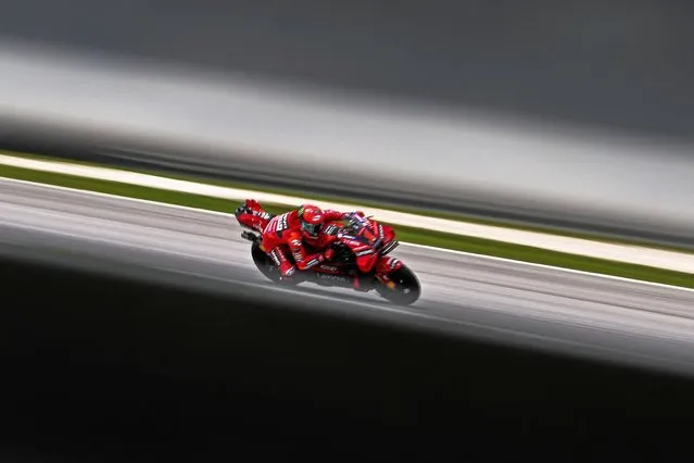 Ducati Lenovo Team's Italian rider Francesco Bagnaia steers his bike during the first practice session of the MotoGP Malaysian Grand Prix at the Sepang International Circuit in Sepang on November 10, 2023. (Photo by Mohd Rasfan/AFP Photo)