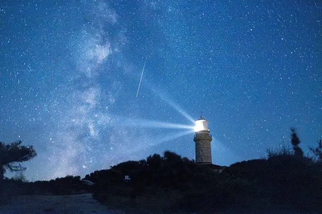A meteor streaks in the night sky during the annual Perseid meteor shower on the island of Lastovo, Croatia on August 12, 2023. (Photo by Antonio Bronic/Reuters)