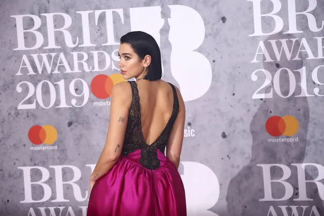 Singer Dua Lipa poses for photographers upon arrival at the Brit Awards in London, Wednesday, February 20, 2019. (Photo by Joel C. Ryan/Invision/AP Photo)