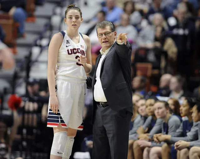 Connecticut head coach Geno Auriemma, right, talks with player Katie Lou Samuelson during the first half of an NCAA college basketball game in the American Athletic Conference tournament semifinals at Mohegan Sun Arena, Sunday, March 6, 2016, in Uncasville, Conn. (Photo by Jessica Hill/AP Photo)