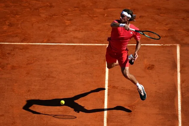 Stefanos Tsitsipas of Greece returns the ball to Casper Ruud of Norway during their Monte Carlo Tennis Masters final match in Monaco, Sunday, April 14, 2024. (Photo by Daniel Cole/AP Photo)