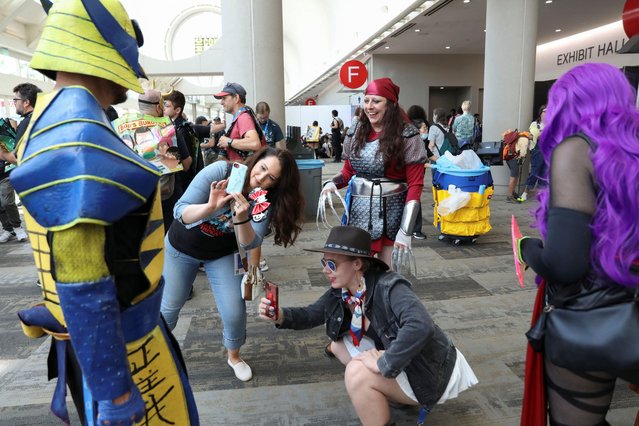 A cosplayer poses for a photo during Comic-Con International in San Diego, California on July 27, 2024. (Photo by Sandy Huffaker/Reuters)