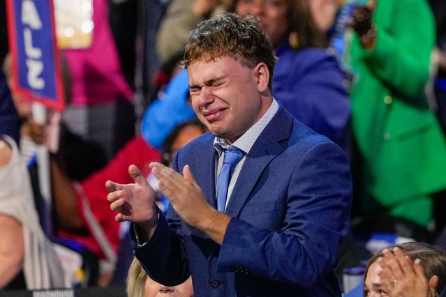 Gus Walz cries as Democratic vice presidential nominee Minnesota Gov. Tim Walz speaks during the Democratic National Convention Wednesday, August 21, 2024, in Chicago. (Photo by Matt Rourke/AP Photo)