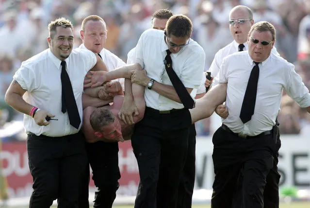 Security escort a streaker off the field during the NatWest Series One Day International between England and Australia played at the County Ground on June 19, 2005 in Bristol, United Kingdom. (Photo by Tom Shaw/Getty Images)