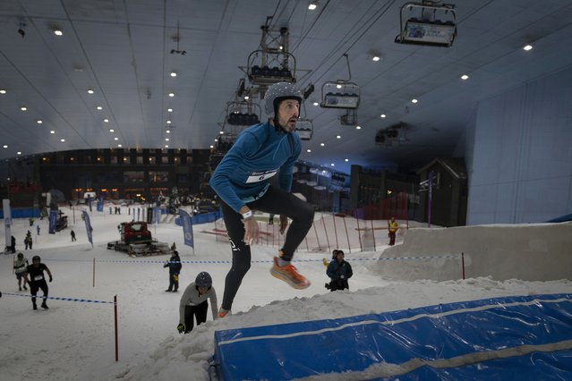 Participants compete in the Ice Warrior Challenge at the indoor Ski Dubai complex in Dubai, United Arab Emirates, Sunday, September 22, 2024. (Photo by Altaf Qadri/AP Photo)