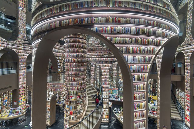 Visitors read books at Zhongshuge Bookstore in Chengdu, China, on October 13, 2024. (Photo by Costfoto/NurPhoto/Rex Features/Shutterstock)