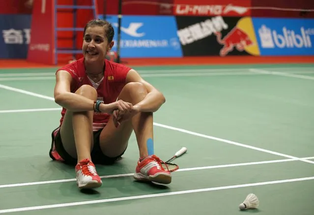 Spain's Carolina Marin reacts after winning India's Saina Nehwal after their women's finals badminton match at the BWF World Championships in Jakarta, Indonesia August 16, 2015. (Photo by Darren Whiteside/Reuters)