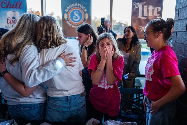 A young supporter reacts after meeting Democratic presidential candidate Vice President Kamala Harris at Trak Houz Bar and Grill in Kalamazoo, MI, on October 26, 2024. (Photo by Demetrius Freeman/The Washington Post)