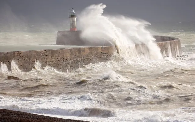 Large waves hit the harbour wall in Newhaven, Britain, October 20, 2021. (Photo by John Sibley/Reuters)