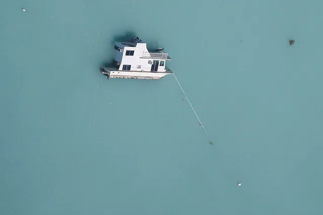 A sunken boat is pictured in an aerial photo in the Keys in Marathon, Florida, September 13, 2017. (Photo by Carlo Allegri/Reuters)