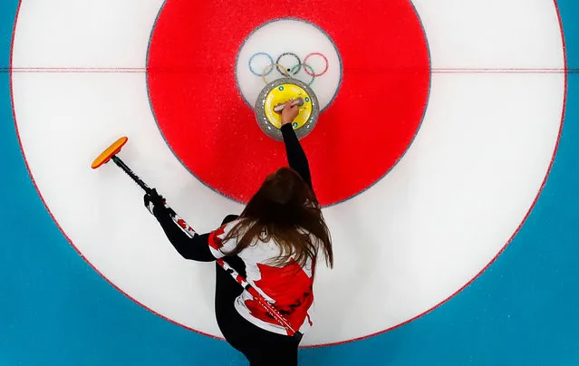 Canada' s skip Rachel Homan launches the stone during their women' s curling match against Japan at the 2018 Winter Olympics in Gangneung, South Korea, Monday, February 19, 2018. (Photo by Toby Melville/Reuters)