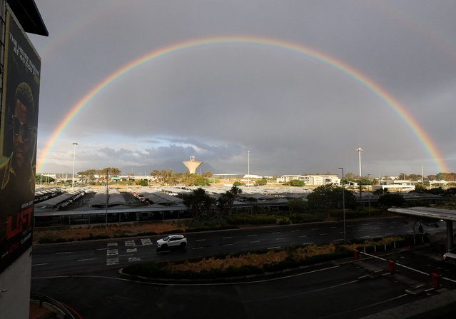 A rainbow is seen from Cape Town International Airport after heavy rain, in Cape Town, South Africa, on November 4, 2024. (Photo by Esa Alexander/Reuters)