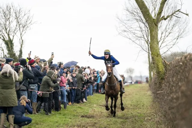 Jason Carver riding Start Me Up crosses the finish line to win England's oldest horse race, the Kiplingcotes Derby, near Market Weighton, East Yorkshire on Thursday, March 16, 2023, which started in 1519 and traditionally takes place on the third Thursday of March. (Photo by Danny Lawson/PA Images via Getty Images)