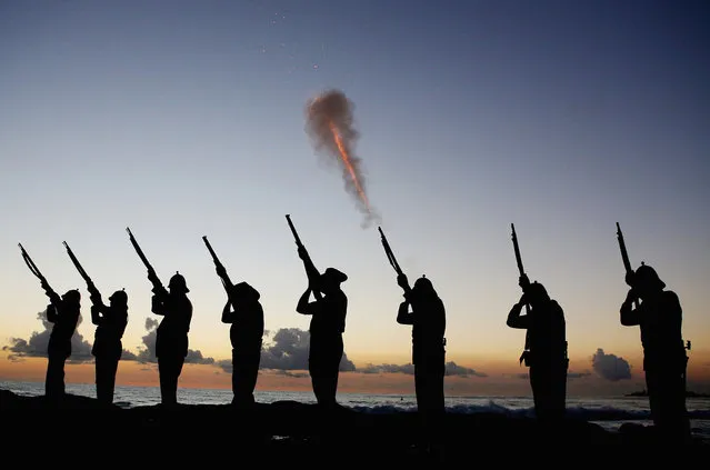 Members of the Albert Battery shoot a volley of fire during the ANZAC (Australia New Zealand Army Corps) dawn service at Currumbin Surf Life Saving Club on April 25, 2013 in Gold Coast, Australia. Veterans, dignitaries and members of the public today marked the 98th anniversary of ANZAC Day,  April 25, 1915 when allied Australian and New Zealand First World War forces landed on the Gallipoli Peninsula. Commemoration events are held across both countries in remembrance of those who fought and died in all wars.  (Photo by Chris Hyde/Getty Images)