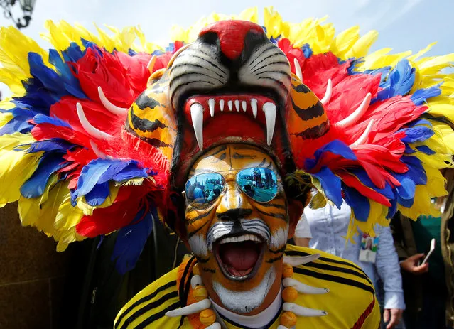 A supporter of the Colombian national soccer team cheers on the first day of the 2018 FIFA World Cup in central Moscow, Russia on June 14, 2018. (Photo by Sergei Karpukhin/Reuters)