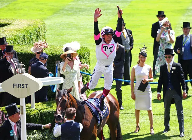 Frankie Dettori performs his flying dismount from Porta Fortuna as he celebrates after winning the 14:30 Albany Stakes at Ascot Racecourse, Ascot, Britain on June 23, 2023. (Photo by Toby Melville/Reuters)