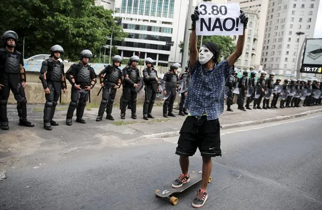 A demonstrator takes part in a protest against fare hikes for city buses in Sao Paulo, Brazil, January 8, 2016. (Photo by Nacho Doce/Reuters)