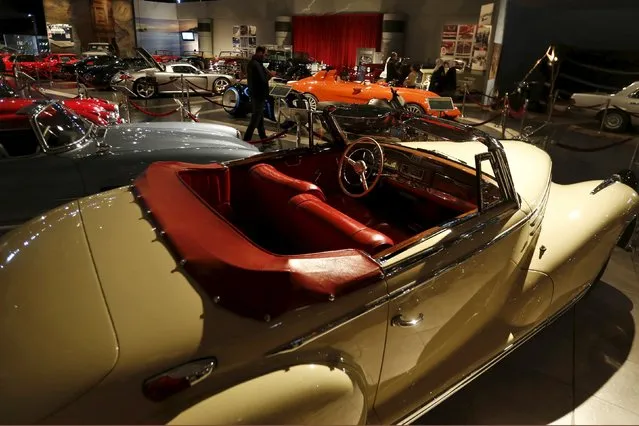 Visitors walk in front of cars owned by the Jordanian Royal family on display at the Royal Automobile Museum in Amman, Jordan, January 17, 2016. (Photo by Muhammad Hamed/Reuters)