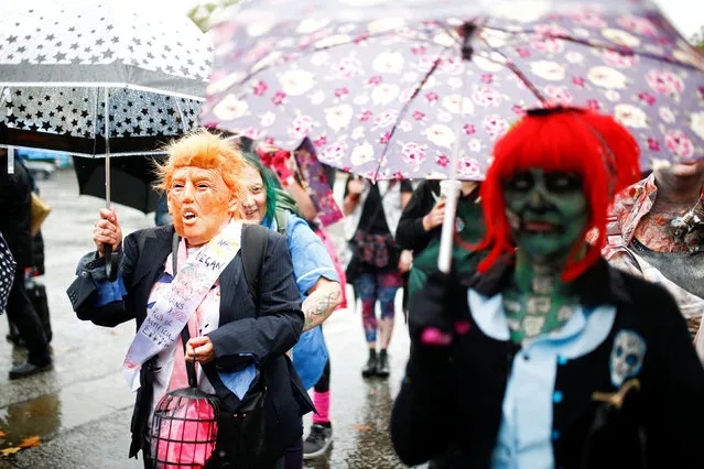 People participate in the World Zombie Day in London, Britain, October 6, 2018. (Photo by Henry Nicholls/Reuters)