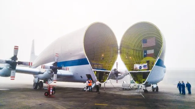 This NASA photo released February 1, 2016 shows NASA's Super Guppy aircraft as it readies to transport the Orion spacecraft pressure vessel for Exploration Mission-1 from the Michoud Assembly Facility in Louisiana to Kennedy Space Center in Florida. The pressure vessel will fly on the first integrated launch of Orion and NASA's powerful new rocket, the Space Launch System. The test flight, which will fly without crew, will demonstrate the agencys new capability to launch future deep space missions, which include missions to an asteroid and Mars. (Photo by AFP Photo/NASA)
