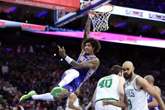 Kelly Oubre Jr. #9 of the Philadelphia 76ers reacts after dunking during the second quarter against the Boston Celtics at the Wells Fargo Center on November 08, 2023 in Philadelphia, Pennsylvania. (Photo by Tim Nwachukwu/Getty Images)