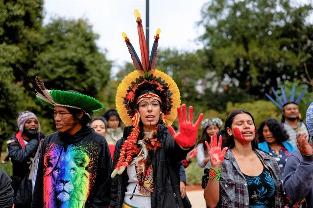 Indigenous people protest to mark International Indigenous Women's Day and Amazon Day, celebrated on September 5, and in defence of the Amazon and the Brazilian biomes, in Sao Paulo, Brazil on September 4, 2022. (Photo by Amanda Perobelli/Reuters)