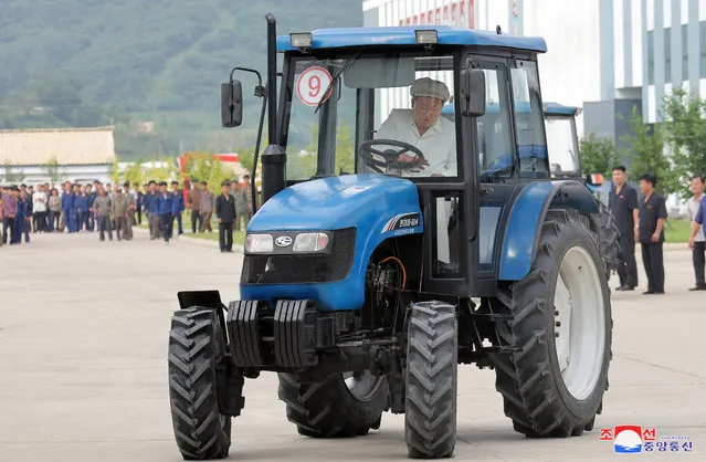 North Korean leader Kim Jong Un sits in a tractor during an inspection of the Kumsong Tractor Factory in North Korea on August 23, 2023 in this photo released by North Korea's Korean Central News Agency (KCNA). (Photo by KCNA via Reuters)