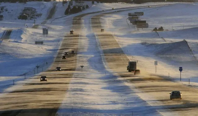 Tribune Strong winds and ground blizzard conditions greeted motorists on Interstate 94 around sunrise, Thursday, January 12, 2017, west of Mandan, N.D. An Arctic cold front entered the state with winds gusting to 55 mph reducing visibility along the interstate and causing hazardous travel conditions and dangerous wind chills. (Photo by Tom Stromme/The Bismarck Tribune via AP Photo)