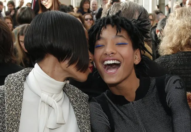 Willow Smith, right, and her mother Jada Pinkett Smith share a laugh before Chanel's Fall-Winter 2016-2017 ready to wear fashion collection presented in Paris, Tuesday, March 8, 2016. (Photo by Thibault Camus/AP Photo)
