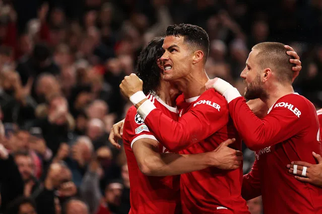 Cristiano Ronaldo of Manchester United celebrates after scoring their side's third goal  during the UEFA Champions League group F match between Manchester United and Atalanta at Old Trafford on October 20, 2021 in Manchester, England. (Photo by Naomi Baker/Getty Images)