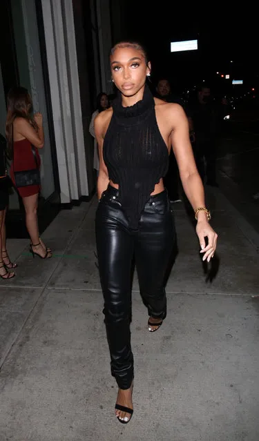 Model Lori Harvey stuns in a black outfit while getting dinner at Catch in Los Angeles on November 14, 2021. (Photo by HEDO/Backgrid USA)
