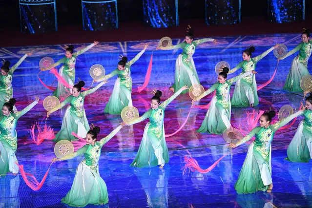 Dancers perform as part of an evening gala staged for the opening ceremony of the International Horticultural Exhibition in Beijing, China on April 28, 2019. (Photo by Jin Liangkuai/Xinhua News Agency/Barcroft Images)