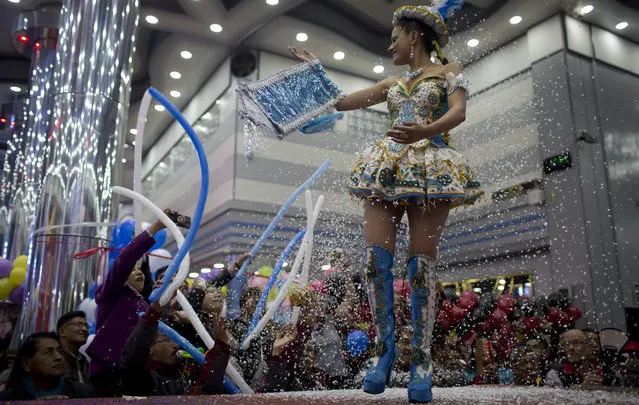 A contestant competes in the Queen of Great Power contest, in La Paz, Bolivia, Friday, May 24, 2019. (Photo by Juan Karita/AP Photo)