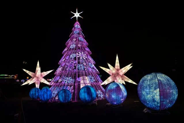 A luminous Christmas tree and decorations during the launch night of Lightopia London 2021 at Crystal Palace Park on November 18, 2021 in London, England. (Photo by John Phillips/Getty Images for Lightopia London)