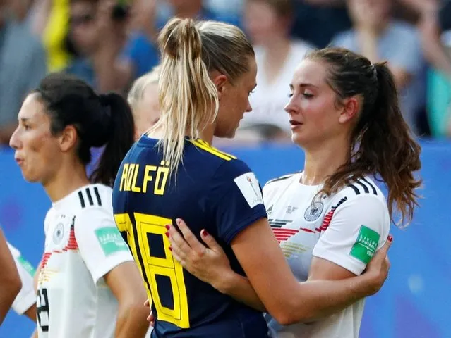 Sweden's Fridolina Rolfo comforts Germany's Sara Daebritz, right, during the Women's World Cup quarterfinal soccer match between Germany and Sweden at Roazhon Park in Rennes, France, Saturday, June 29, 2019. (Photo by Emmanuel Foudrot/Reuters)