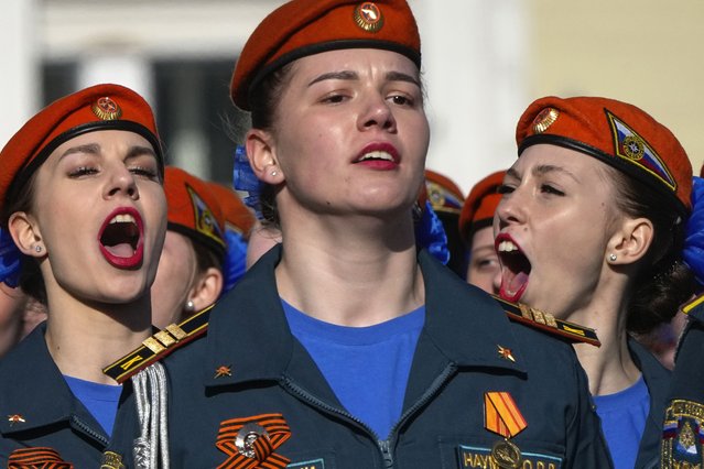Russia's Emergency Situations Ministry female cadets shout as they march during a rehearsal in St. Petersburg, Russia, Tuesday, April 30, 2024 for the Victory Day military parade which will take place at Dvortsovaya (Palace) Square on May 9 to celebrate 79 years after the victory in World War II. (Photo by Dmitri Lovetsky/AP Photo)