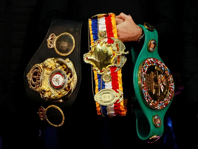 General view of Callum Smith holding the WBA Super World, WBC Diamond and Ring Magazine Super Middle Weight belts during the press conference at the Cunard Building, Liverpool, Britain on November 21, 2019.(Photo by Jason Cairnduff/Action Images via Reuters)