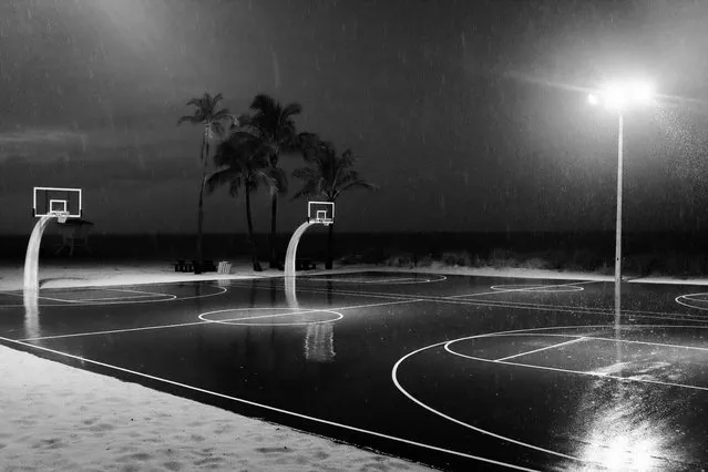 “Stormy playground”. A stormy night on the beach playground. Photo location: Fort Lauderdale, FL, USA. (Photo and caption by Luca Boveri/National Geographic Photo Contest)