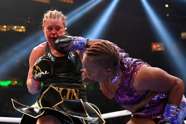 US boxer Franchon Crews-Dezurn (R) and Swedish boxer Elin Cederroos (L) fight during their undisputed super middleweight championship fight at Madison Square Garden on April 30, 2022 in New York City. (Photo by Angela Weiss/AFP Photo)