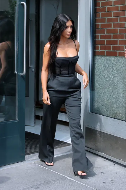 TV personality Kim Kardashian-West, wearing a bustier and pants, leaves her apartment for “The View” in New York City on June 14, 2017. (Photo by Christopher Peterson/Splash News and Pictures)