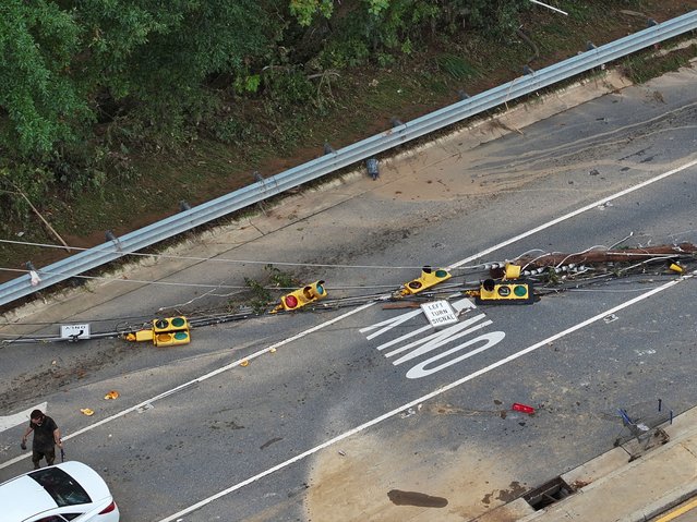 A drone view shows a damaged area, following the passing of Hurricane Helene, in Asheville, North Carolina, September 29, 2024. (Photo by Marco Bello/Reuters)